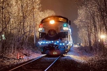 a train on the tracks at night