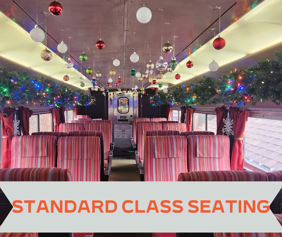 Coach chairs on a train decorated for Christmas