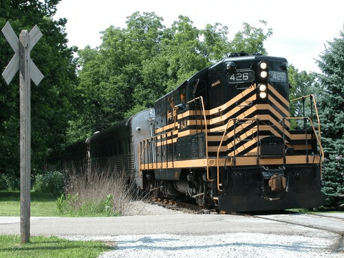 Jay+426+2+ a train is parked on the side of a road