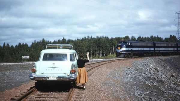 Train2 a truck traveling down a dirt road