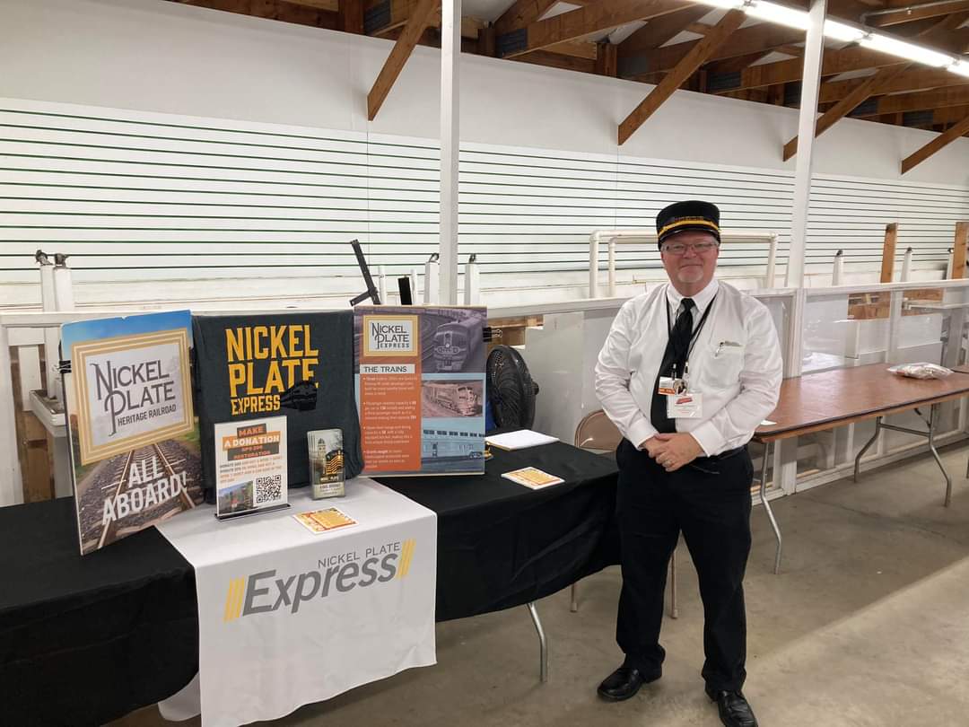 a man standing in front of a building